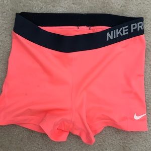 Pink Nike Pro shorts